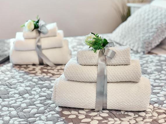A bed or beds in a room at La Casina di Rosa