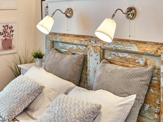 A bed or beds in a room at La Casina di Rosa