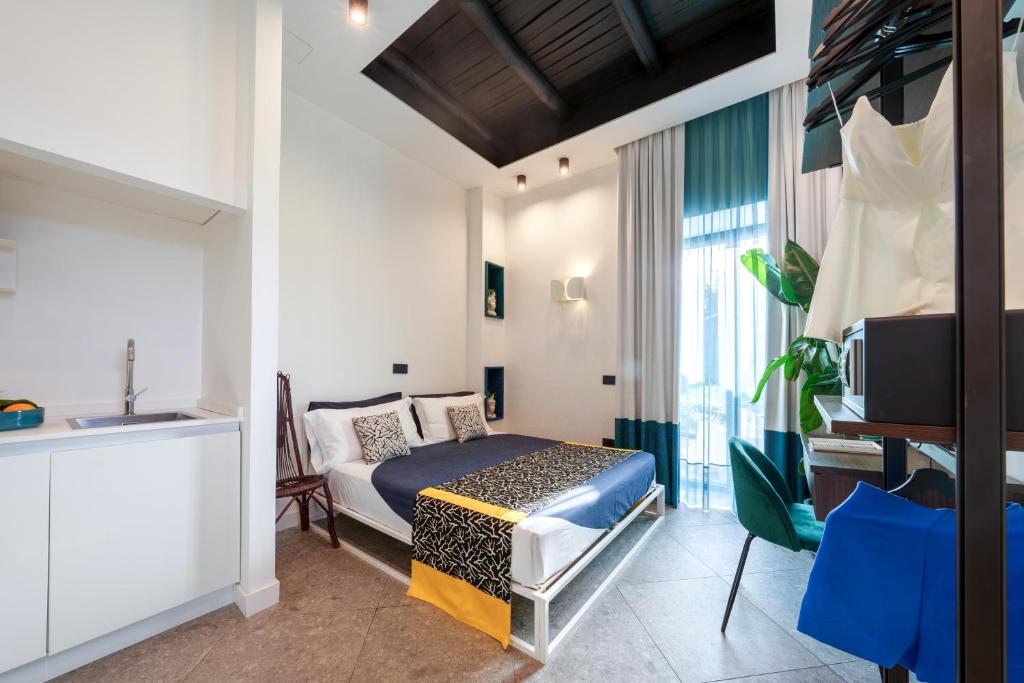 Postel nebo postele na pokoji v ubytování 1912 Relais - Sorrento Coast