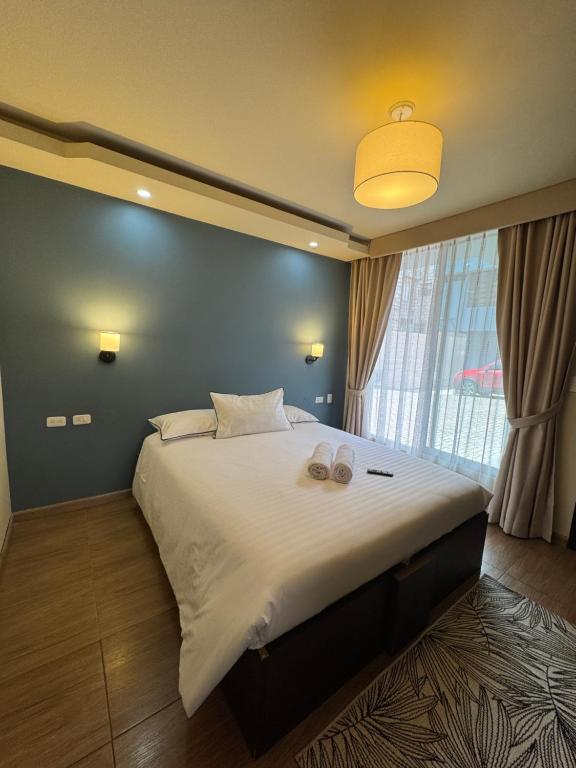 Postel nebo postele na pokoji v ubytování Hotel Casa Agave