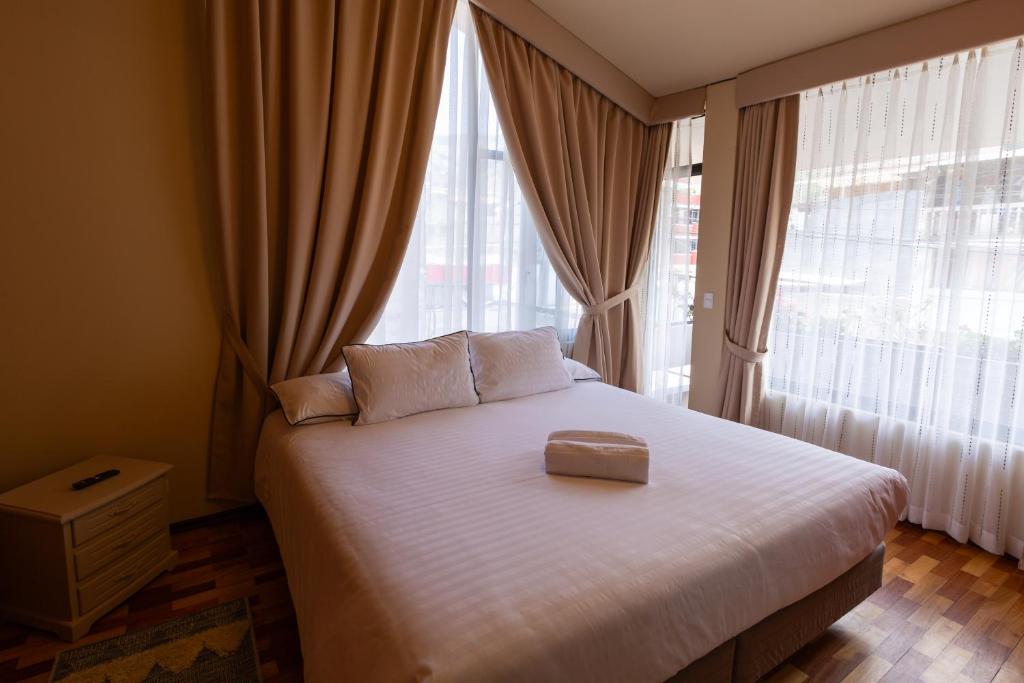 Postel nebo postele na pokoji v ubytování Hotel Casa Agave