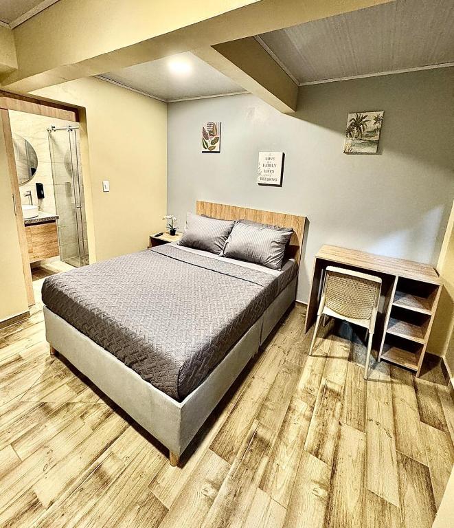 Postel nebo postele na pokoji v ubytování Hostelfc Santa Barbara