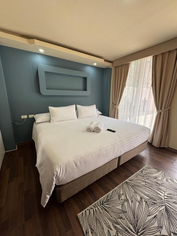 Postel nebo postele na pokoji v ubytování Hotel Casa Agave