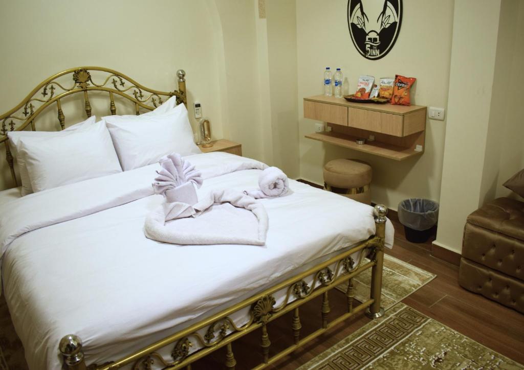 Letto o letti in una camera di The 5 Inn - Pyramids