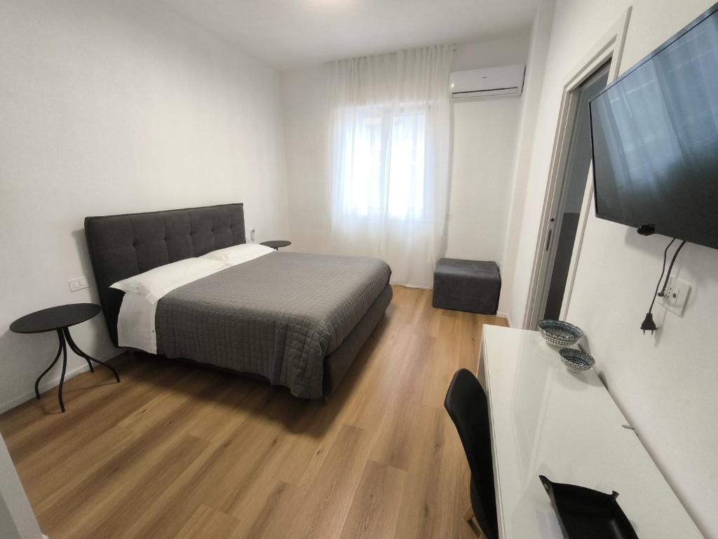 TV a/nebo společenská místnost v ubytování Faber Home