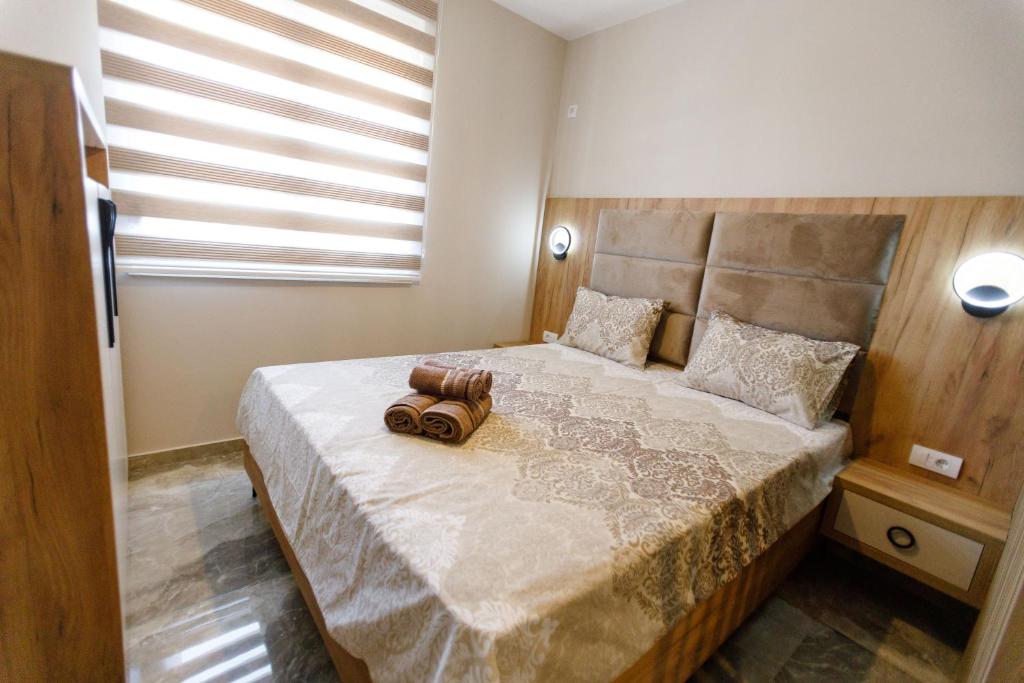 Postel nebo postele na pokoji v ubytování Apartments Posejdon Lux