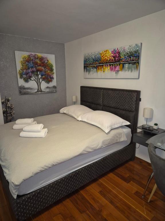 Posteľ alebo postele v izbe v ubytovaní ToMaDi Residence