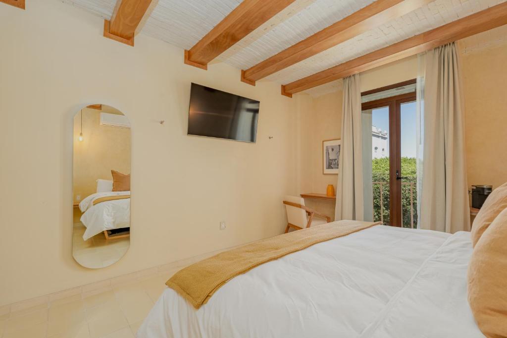 Postel nebo postele na pokoji v ubytování Casa Altos