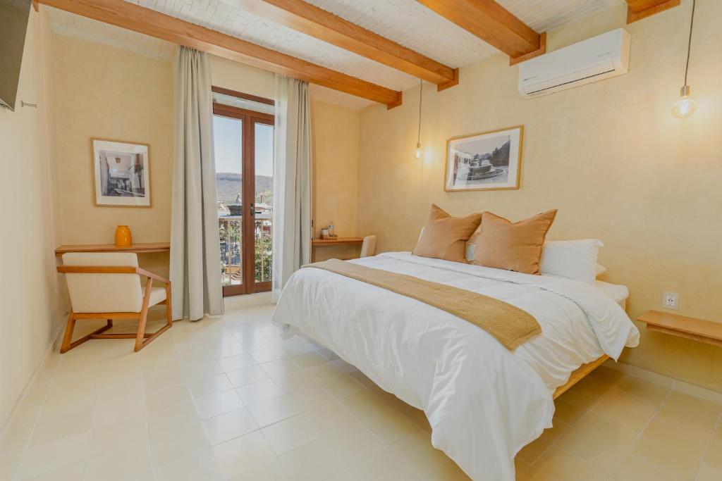 Postel nebo postele na pokoji v ubytování Casa Altos