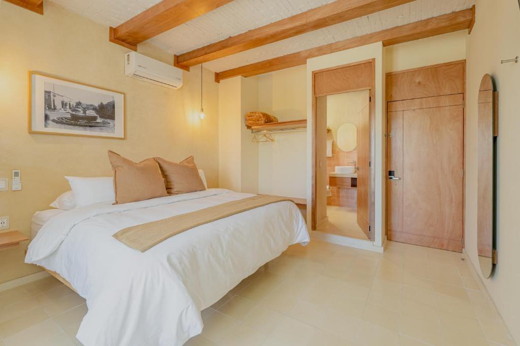 Postel nebo postele na pokoji v ubytování Casa Altos