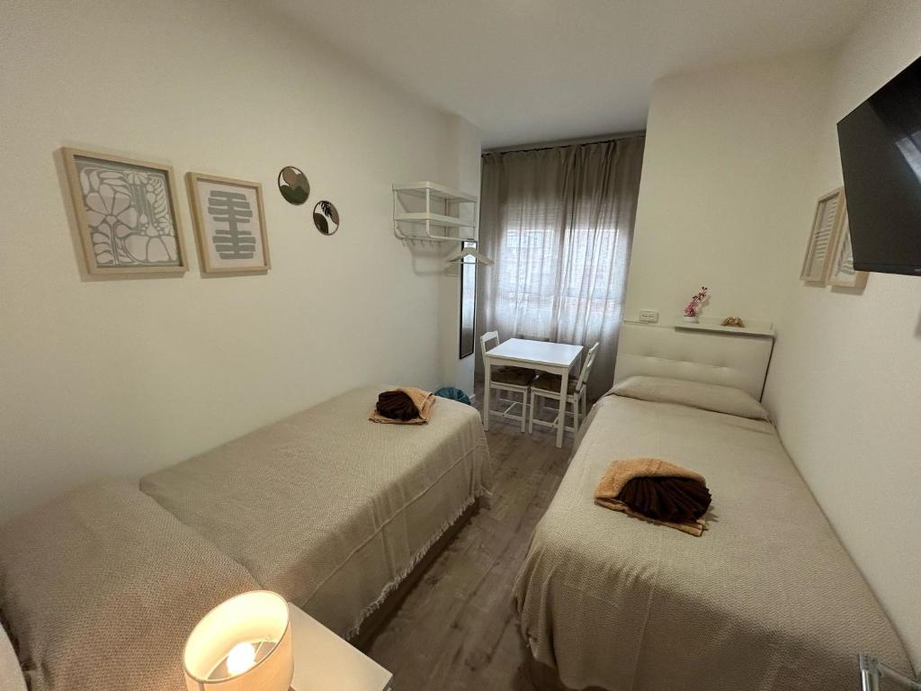 Habitaciones en Embajadores - Resim 1