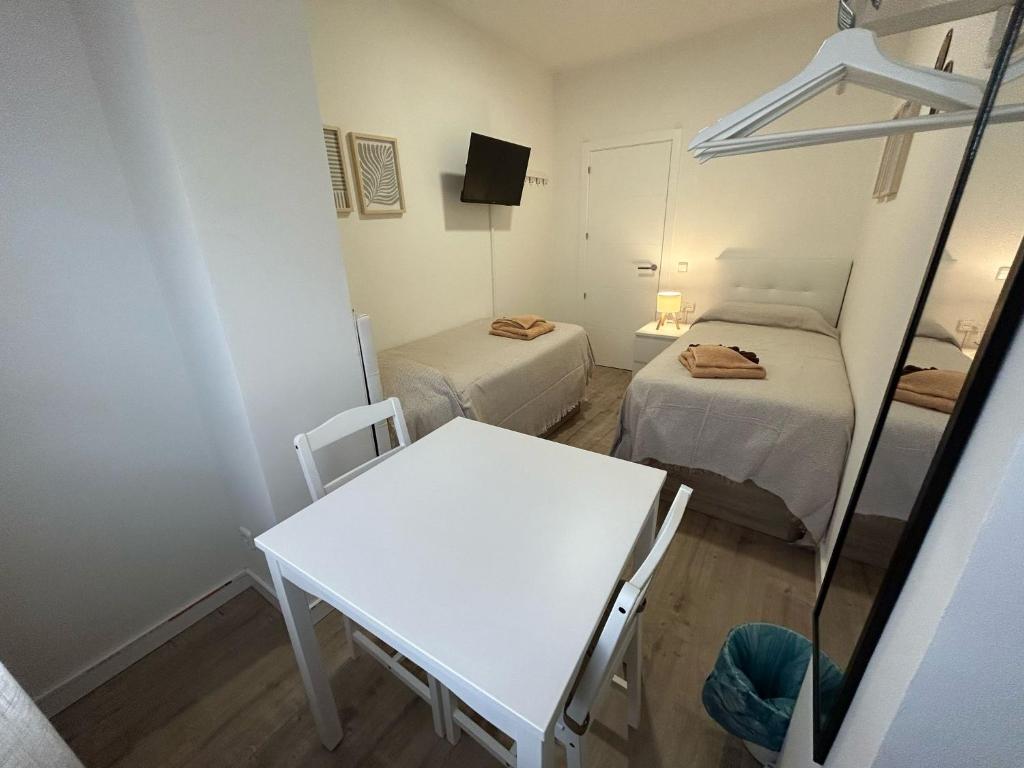 Habitaciones en Embajadores - Resim 15