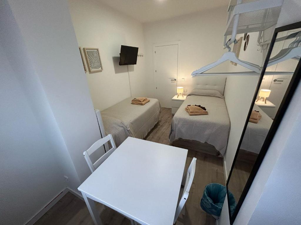 Habitaciones en Embajadores - Resim 4