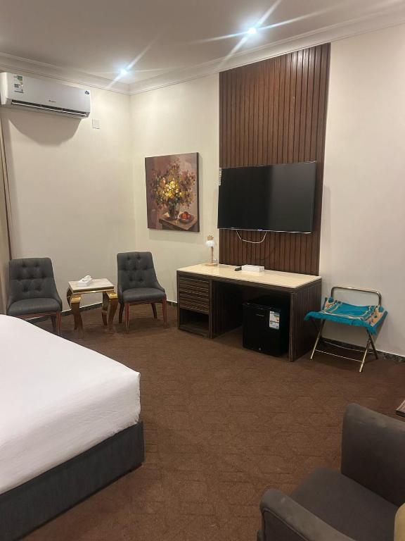 TV a/nebo společenská místnost v ubytování Aseel Hotel Apartment