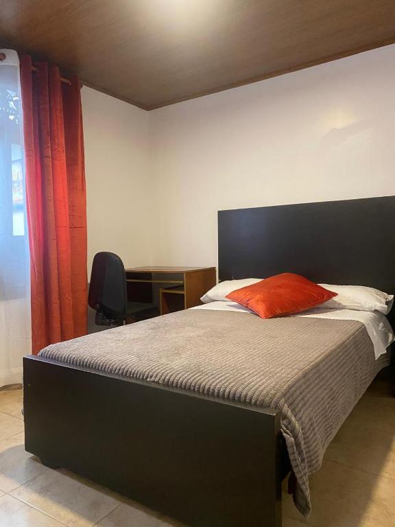 Postel nebo postele na pokoji v ubytování Destino Nómada Calle 11 n 1-38