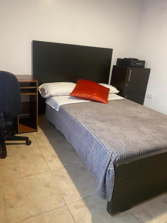 Postel nebo postele na pokoji v ubytování Destino Nómada Calle 11 n 1-38
