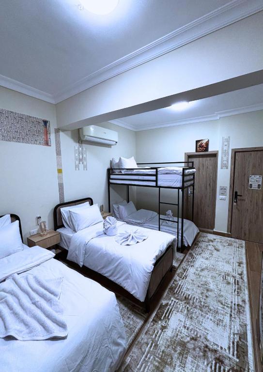 Letto o letti in una camera di The 5 Inn - Pyramids
