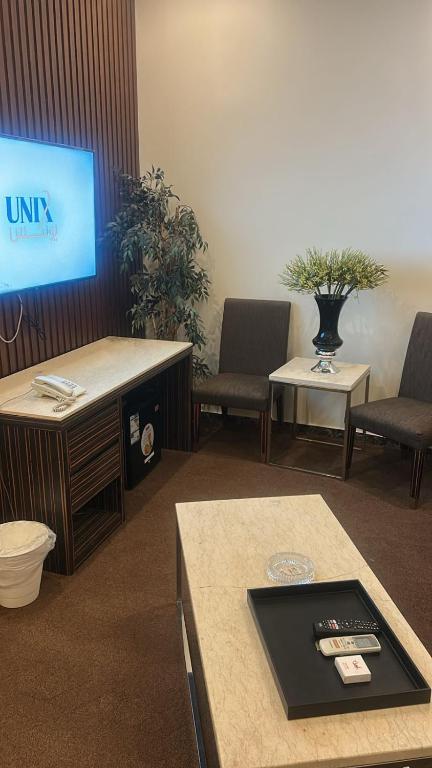 TV a/nebo společenská místnost v ubytování Aseel Hotel Apartment