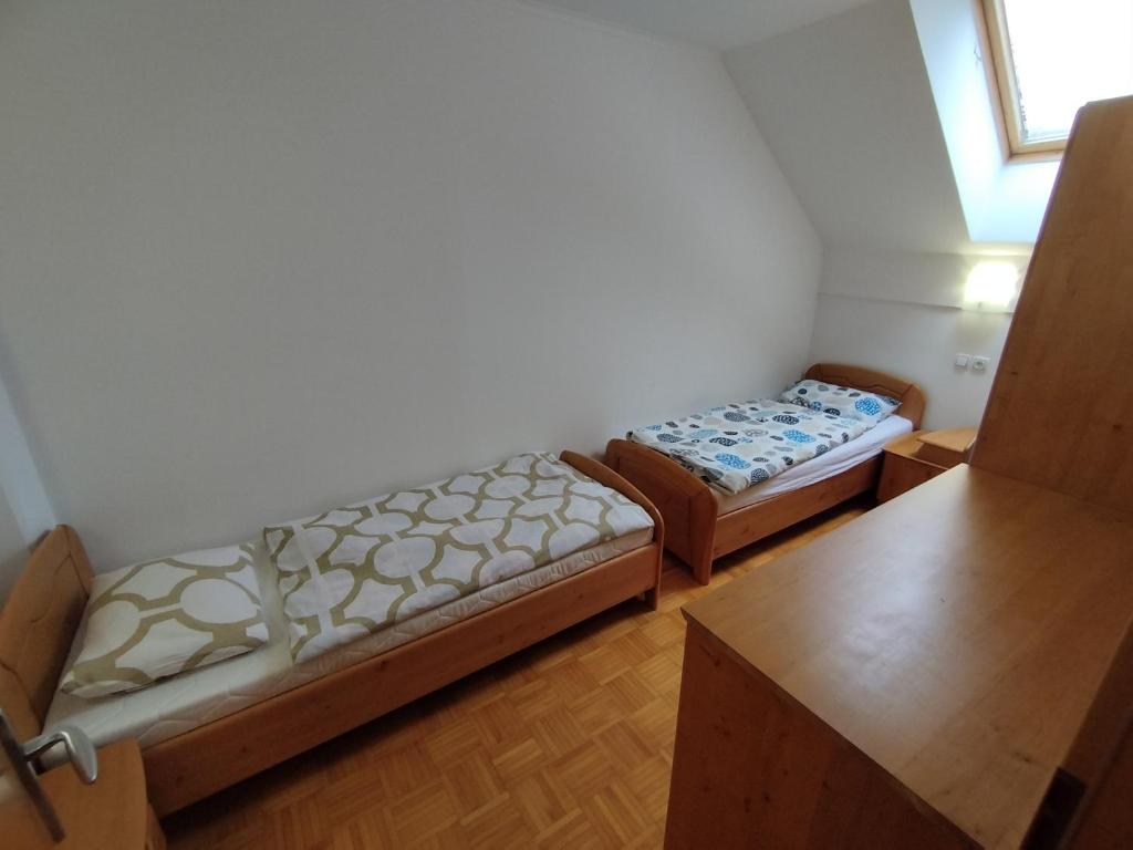 Postel nebo postele na pokoji v ubytování Apartma Valerija