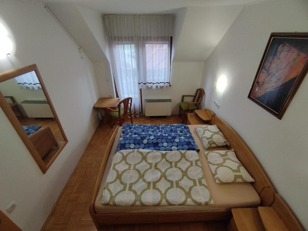 Postel nebo postele na pokoji v ubytování Apartma Valerija