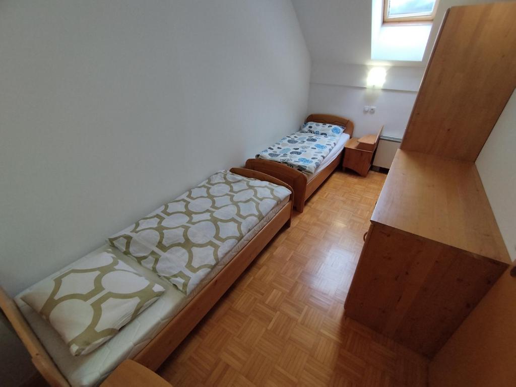 Postel nebo postele na pokoji v ubytování Apartma Valerija