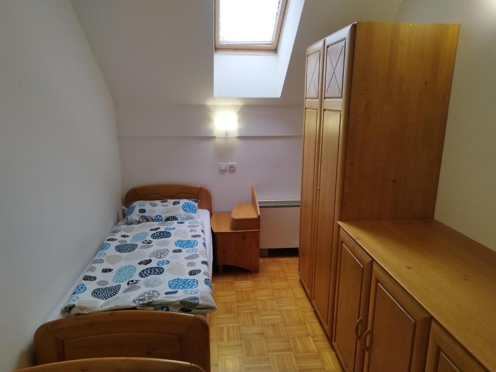 Postel nebo postele na pokoji v ubytování Apartma Valerija