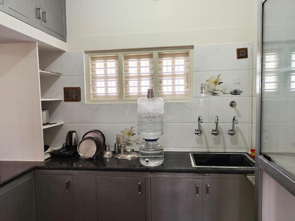 Kuchyň nebo kuchyňský kout v ubytování Galaxy Homestay 4Bhk