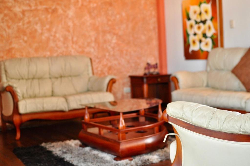 Posezení v ubytování Hotel Coronel