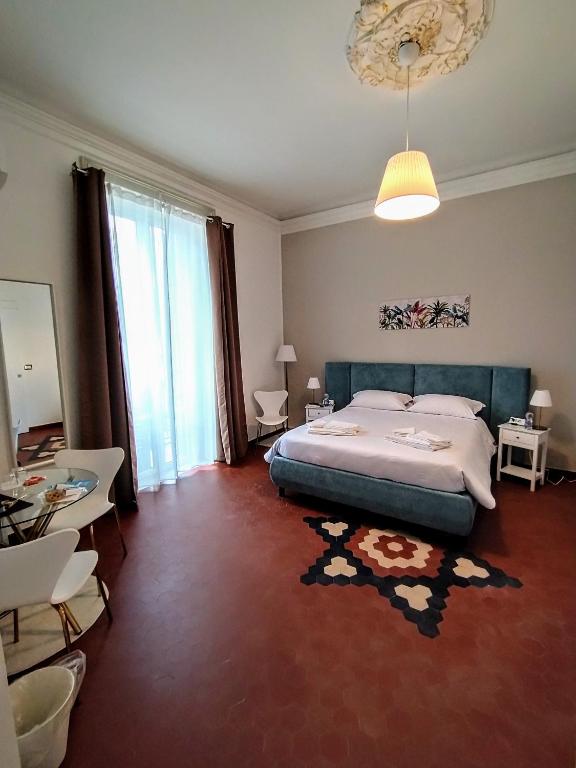 Uma cama ou camas num quarto em Suleima B&B Messina Centro