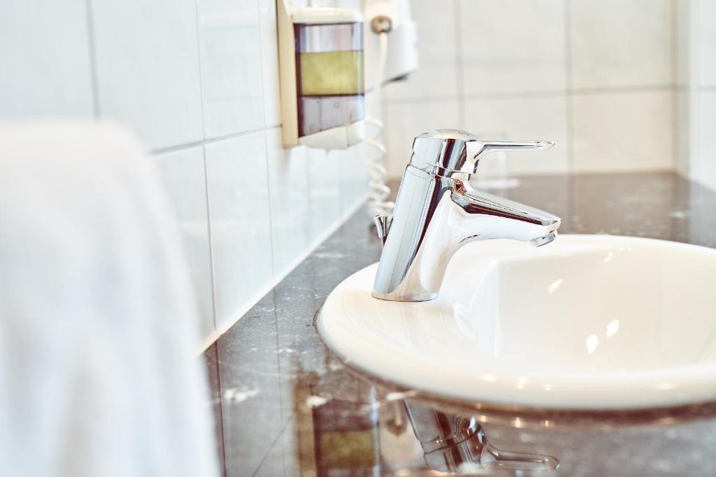 Koupelna v ubytování Das Landhotel am Trätzhof Fulda