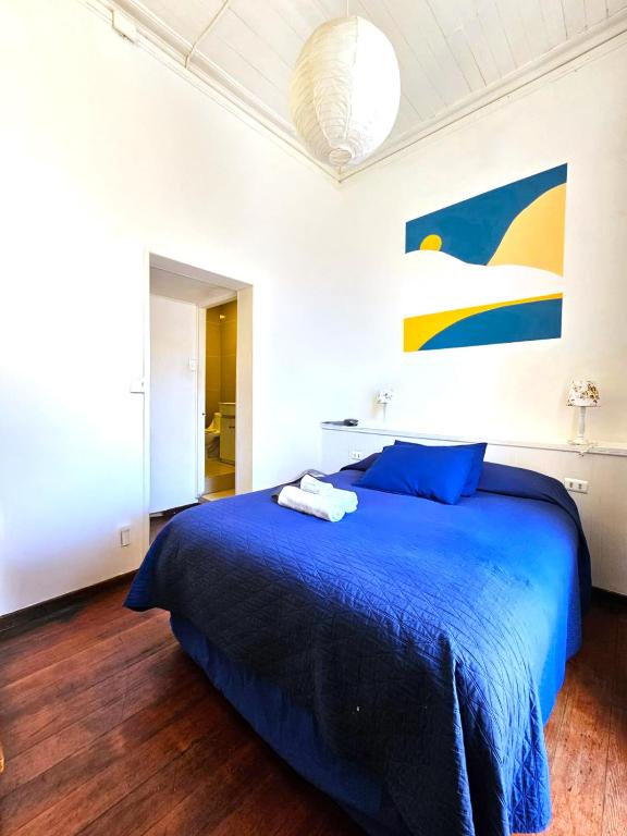 Postel nebo postele na pokoji v ubytování La Galería B&B
