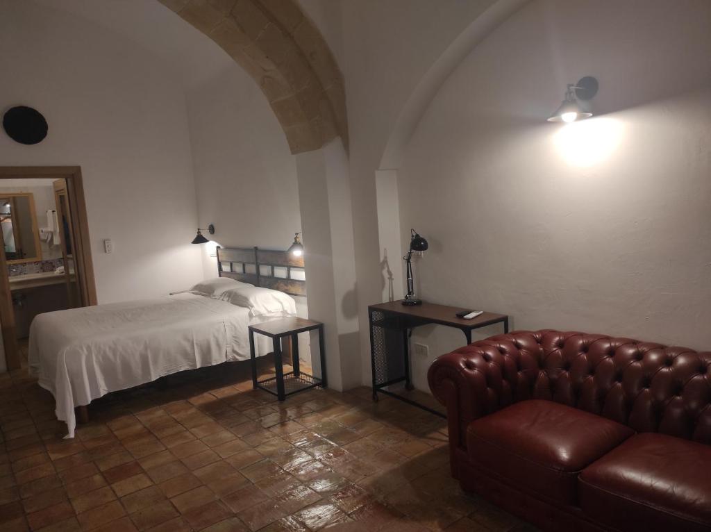 Postel nebo postele na pokoji v ubytování Agli Archi Dimore Storiche