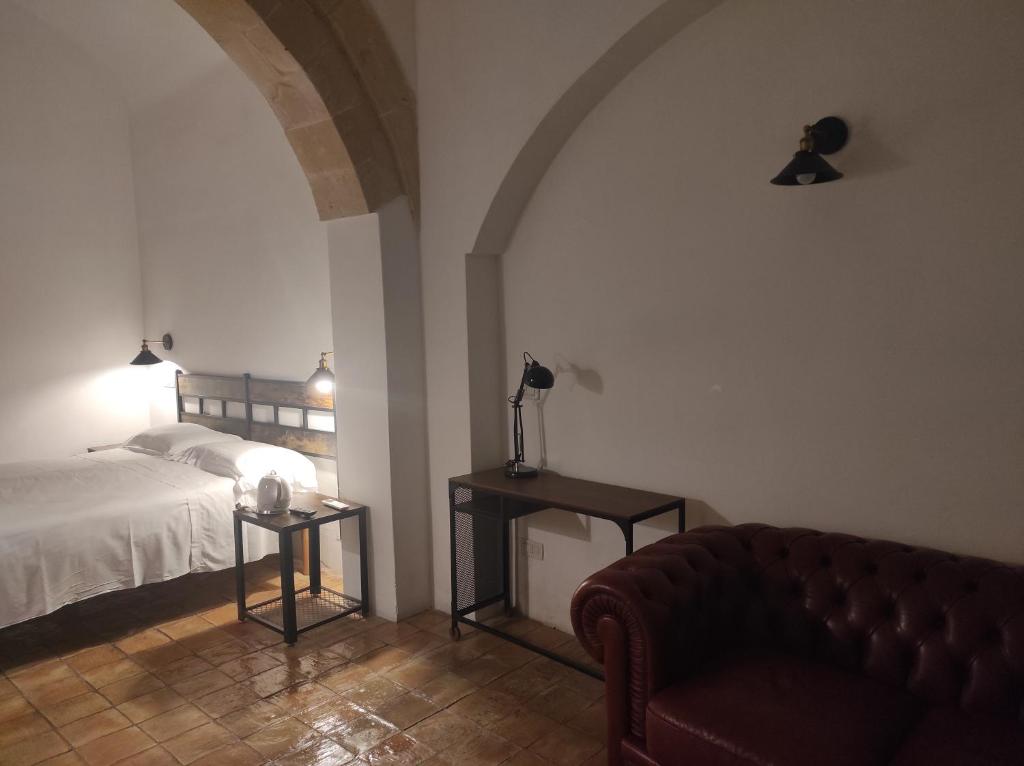 Postel nebo postele na pokoji v ubytování Agli Archi Dimore Storiche