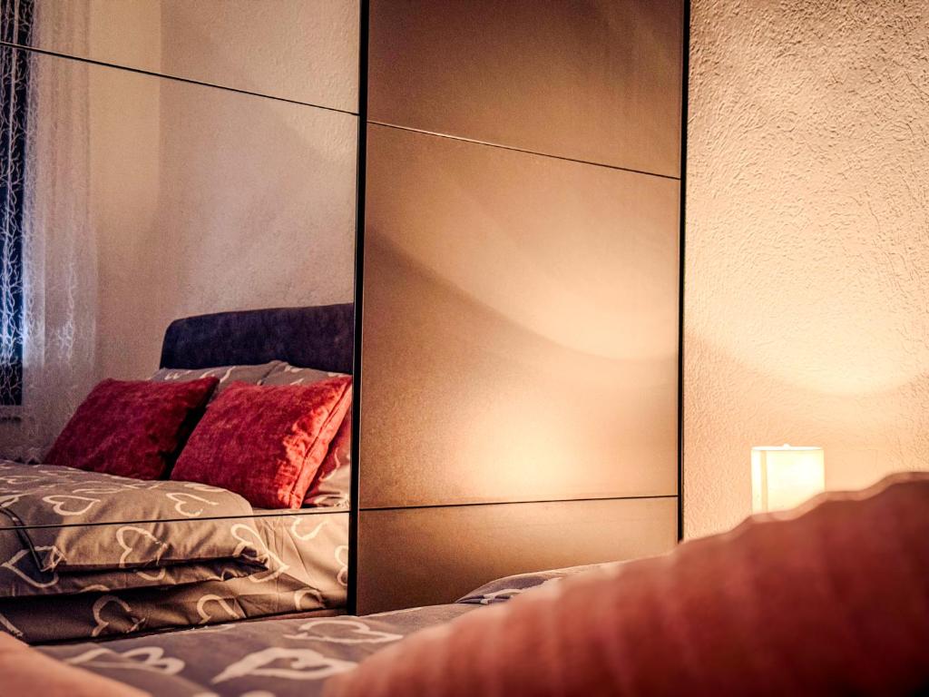 Postel nebo postele na pokoji v ubytování Apartment Lorena