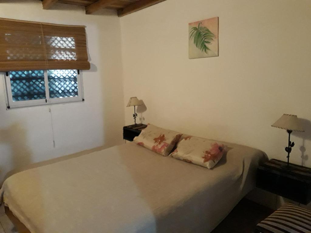 En eller flere senge i et værelse på Descanso