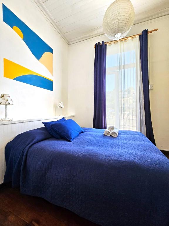 Postel nebo postele na pokoji v ubytování La Galería B&B