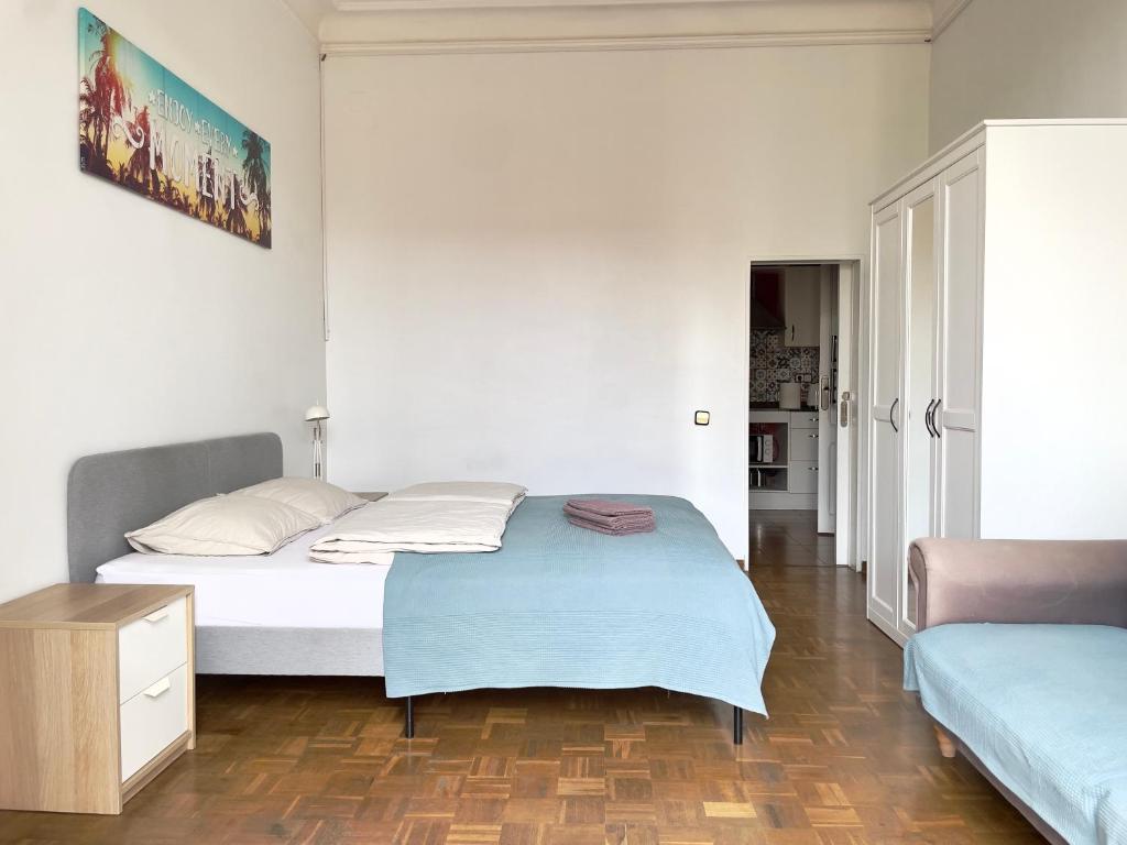 Posteľ alebo postele v izbe v ubytovaní Grand Central Apartment