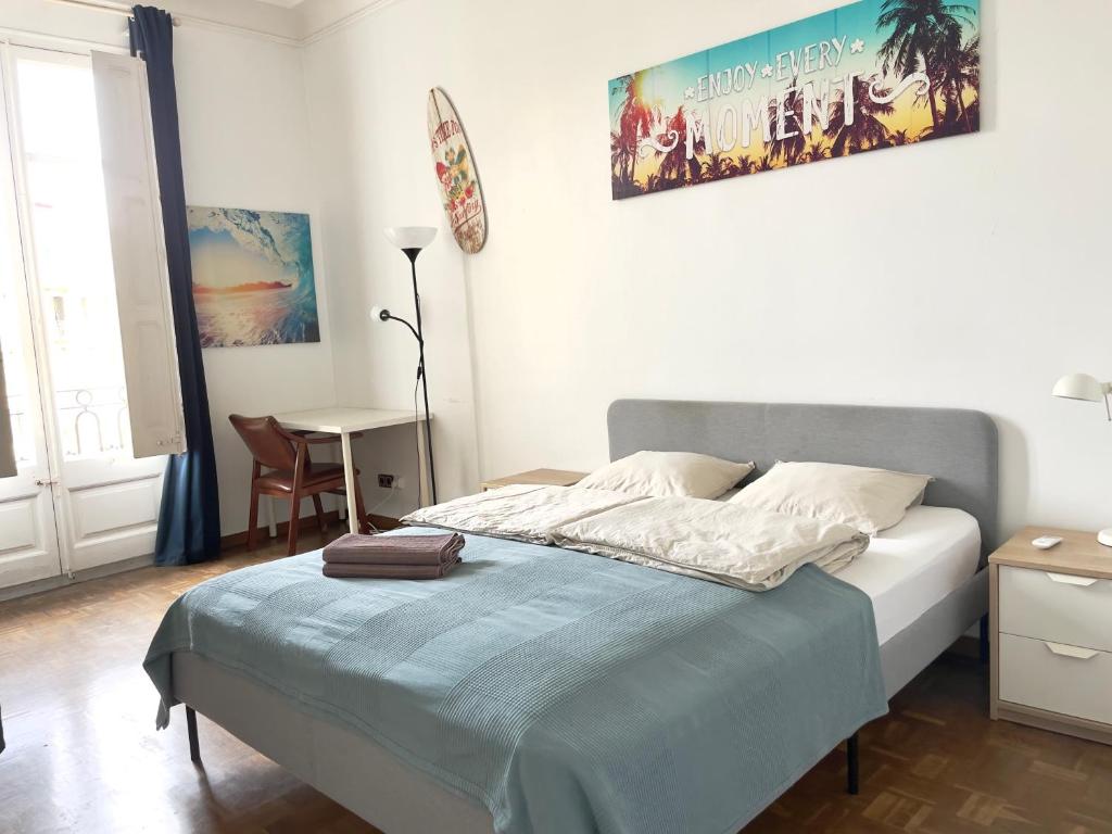 Posteľ alebo postele v izbe v ubytovaní Grand Central Apartment