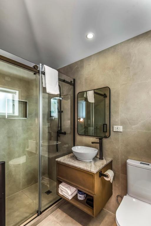 Koupelna v ubytování Poenamo Hotel