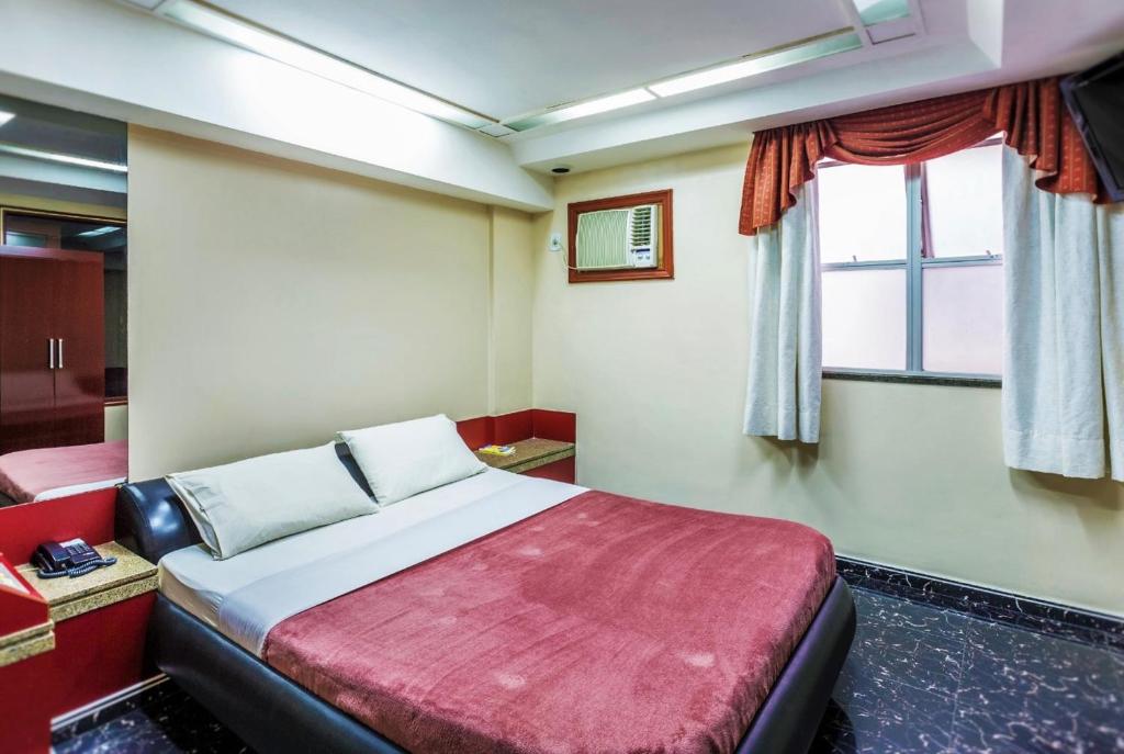 Krevet ili kreveti u jedinici u okviru objekta Hotel Fênix (Adult Only)