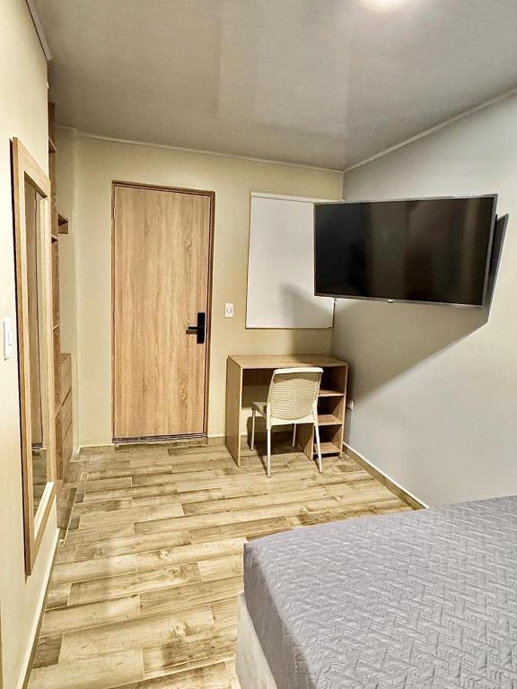 TV a/nebo společenská místnost v ubytování Hostelfc Santa Barbara