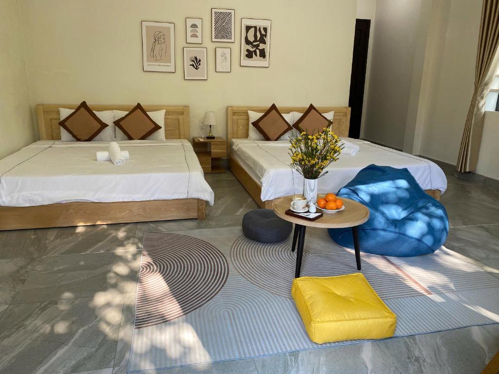 Giường trong phòng chung tại Lavande Hue Homestay