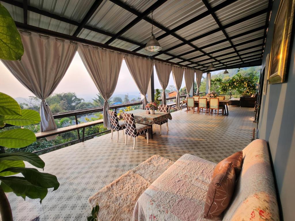 Balkón nebo terasa v ubytování บ้านภูคำฟ้า ดอยปู่ไข่ Baan Phu Kham Fah
