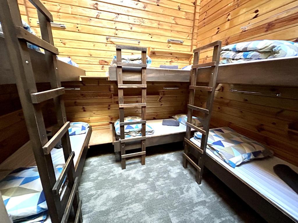 Postel nebo postele na pokoji v ubytování Porters Lodge