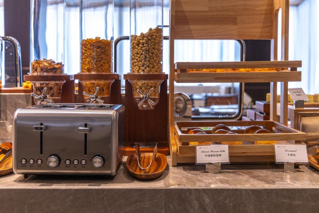 Imagen de la galería de Langju Hotel - Haikou Guomao Center Friendship Sunshine City Branch, en Haikou