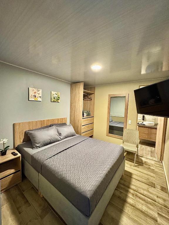 Postel nebo postele na pokoji v ubytování Hostelfc Santa Barbara