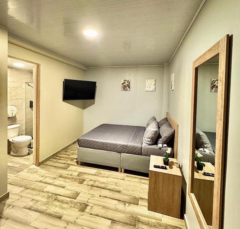TV a/nebo společenská místnost v ubytování Hostelfc Santa Barbara