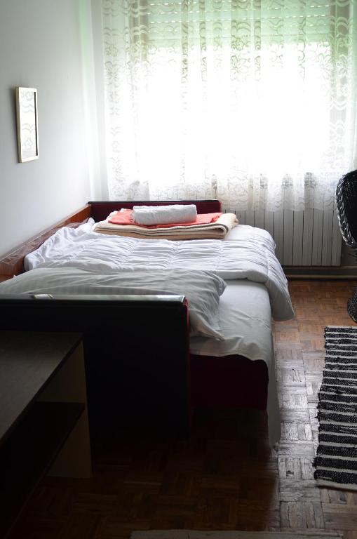 Postel nebo postele na pokoji v ubytování Apartment Relax