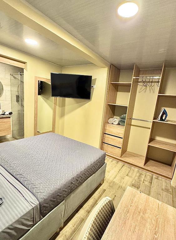 TV a/nebo společenská místnost v ubytování Hostelfc Santa Barbara