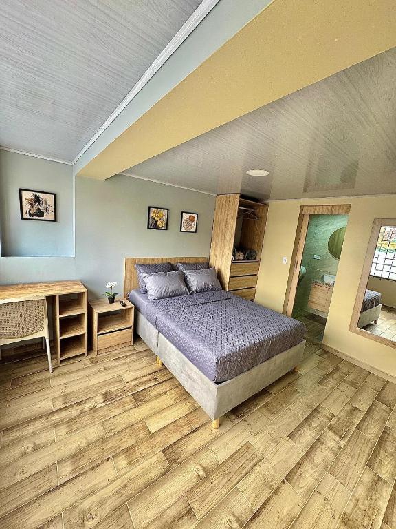 Postel nebo postele na pokoji v ubytování Hostelfc Santa Barbara